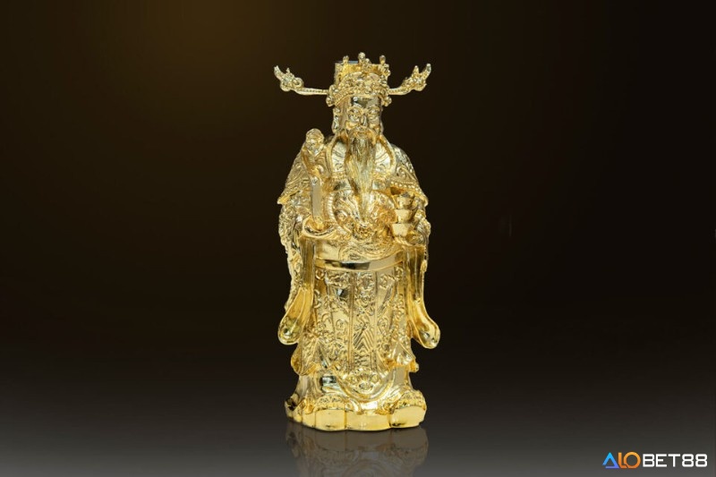 Mơ thấy tượng Thần Tài bằng vàng là điềm báo thuận lợi về tài lộc và thịnh vượng với bạn